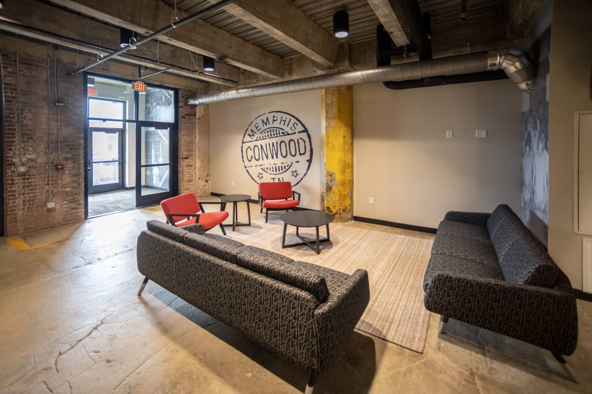 Conwood Flats Apartment Homes community lounge and seating - Memphis, TN