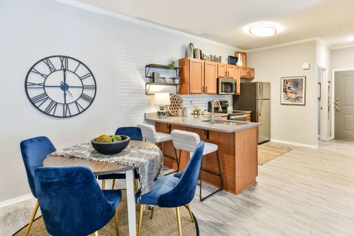 Grand Island Apartments model dining area and kitchen - Memphis, TN