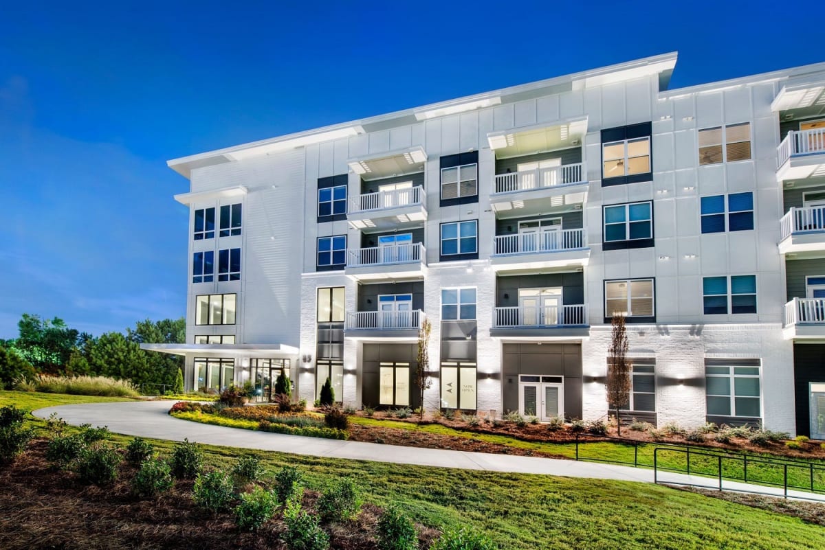 The Barrett exterior building at twilight - Marietta, GA