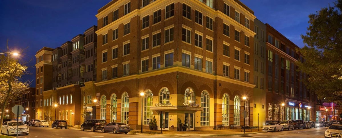 The Kingsley exterior building at dusk - Alexandria, VA