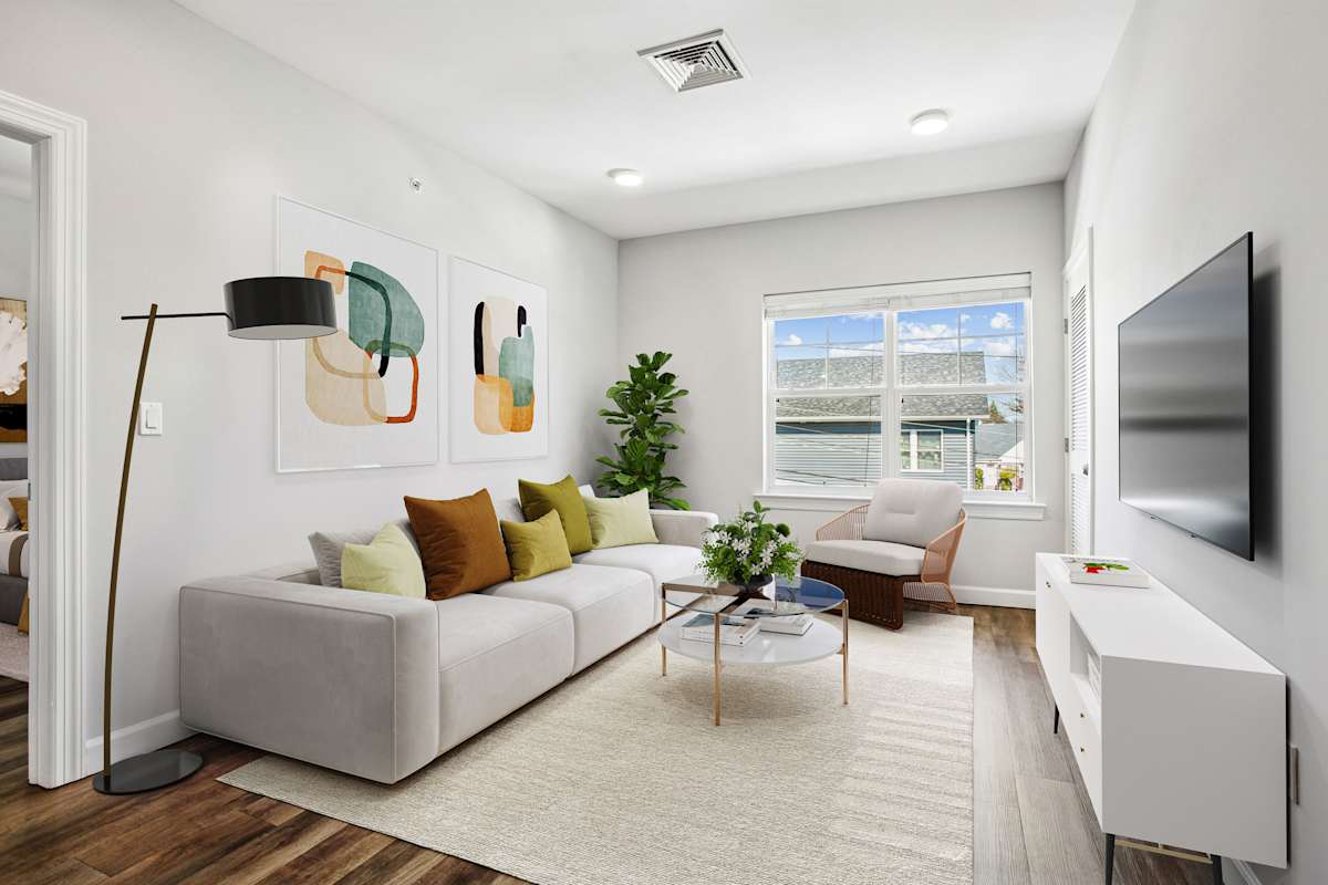 Onyx apartment living room with window view - Uniondale, NY