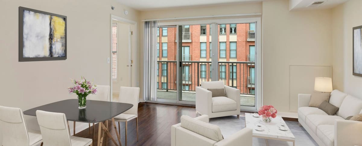The Promenade at Harbor East model apartment living room and kitchen - Baltimore, MD