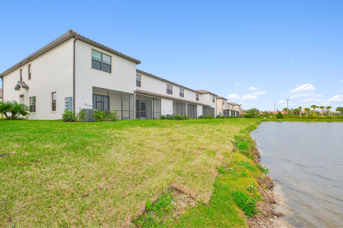 Fiore Townhomes exterior with outdoor space - Venice, FL