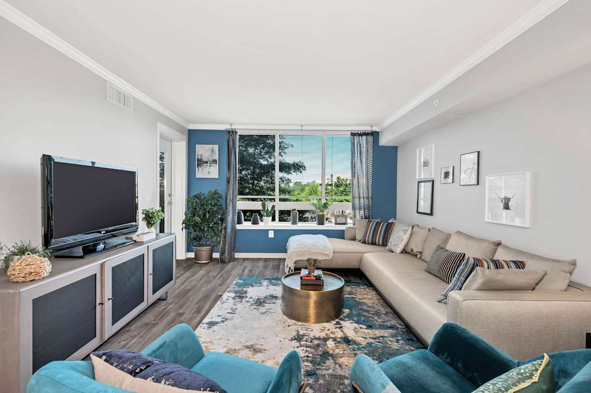 Prosperity Flats living room with large windows - Fairfax, VA