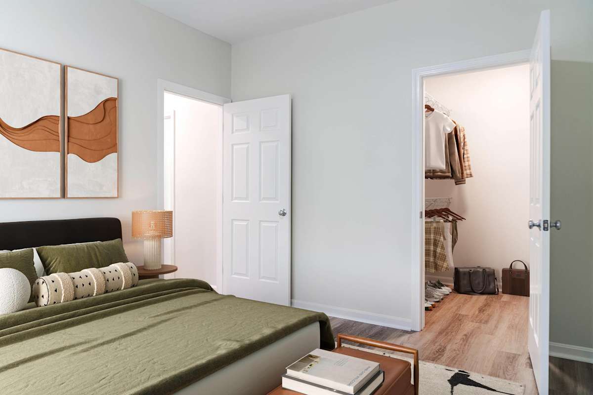 The Ridge apartment primary bedroom with walk-in closet - Waltham, MA