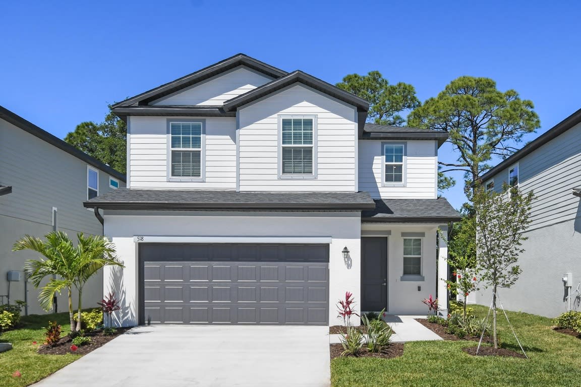 Cantabria attached garages exterior - Bradenton, FL