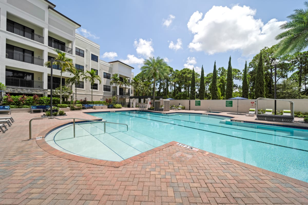 Central Gardens Grand pool deck with cabanas - Palm Beach Gardens, FL
