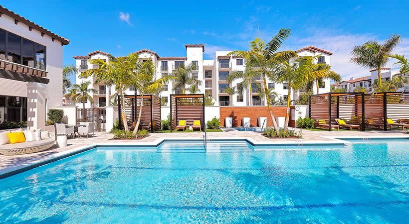 Pacifica swimming pool with sundeck and cabanas - Boynton Beach, FL