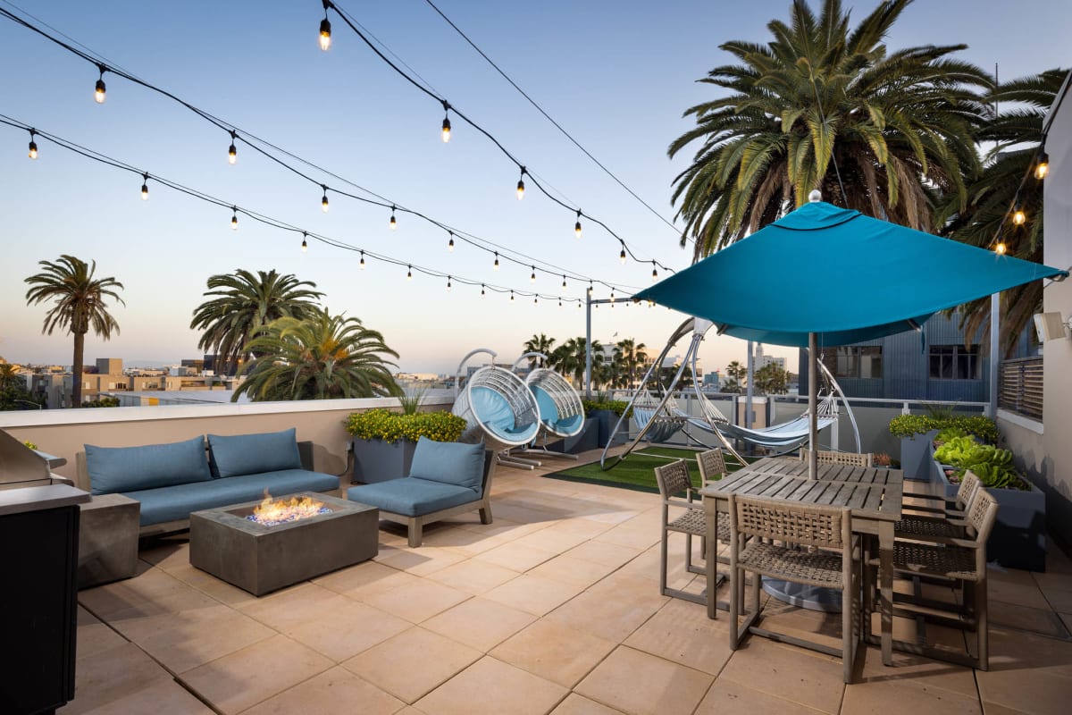 Gibson Santa Monica rooftop deck fire pit at dusk - Santa Monica, CA