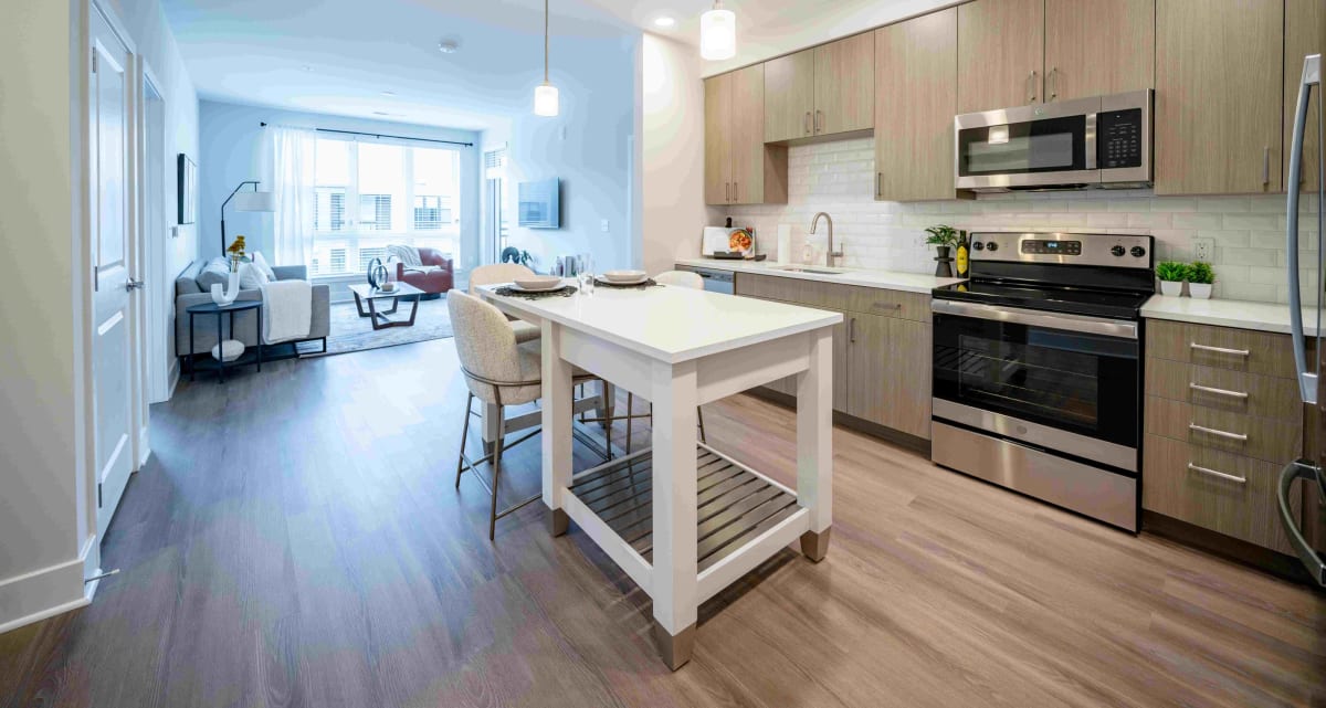 The Rae apartment kitchen with center island - Bethesda, MD