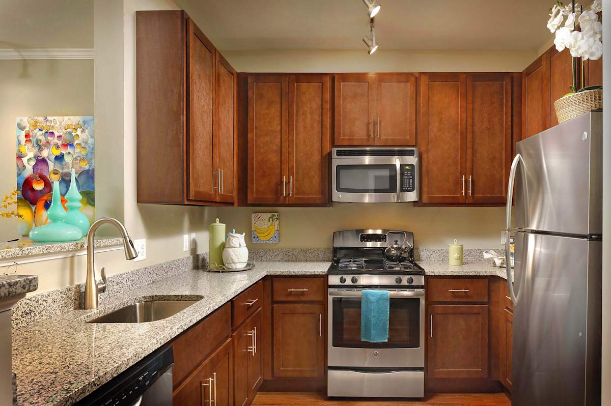 Millstone at Kingsview model kitchen with granite countertops - Germantown, MD
