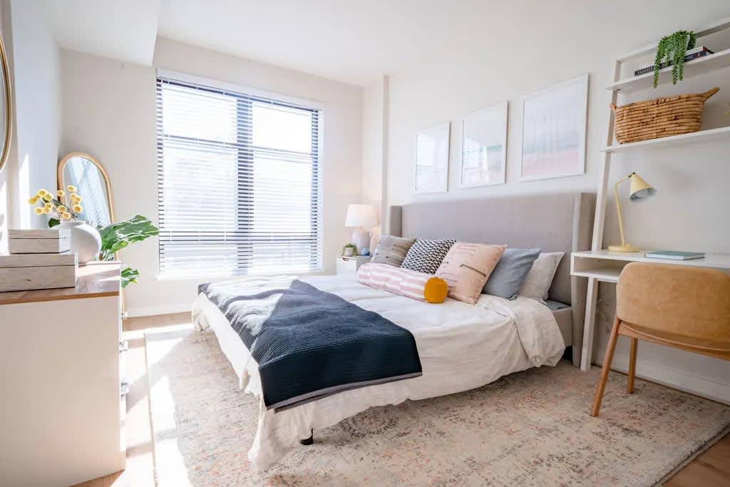 Harwood Flats apartment bedroom with desk and window - North Bethesda, MD