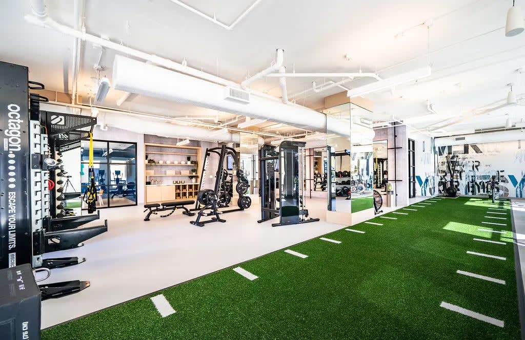 Harwood Flats gym training area with turf and equipment - North Bethesda, MD