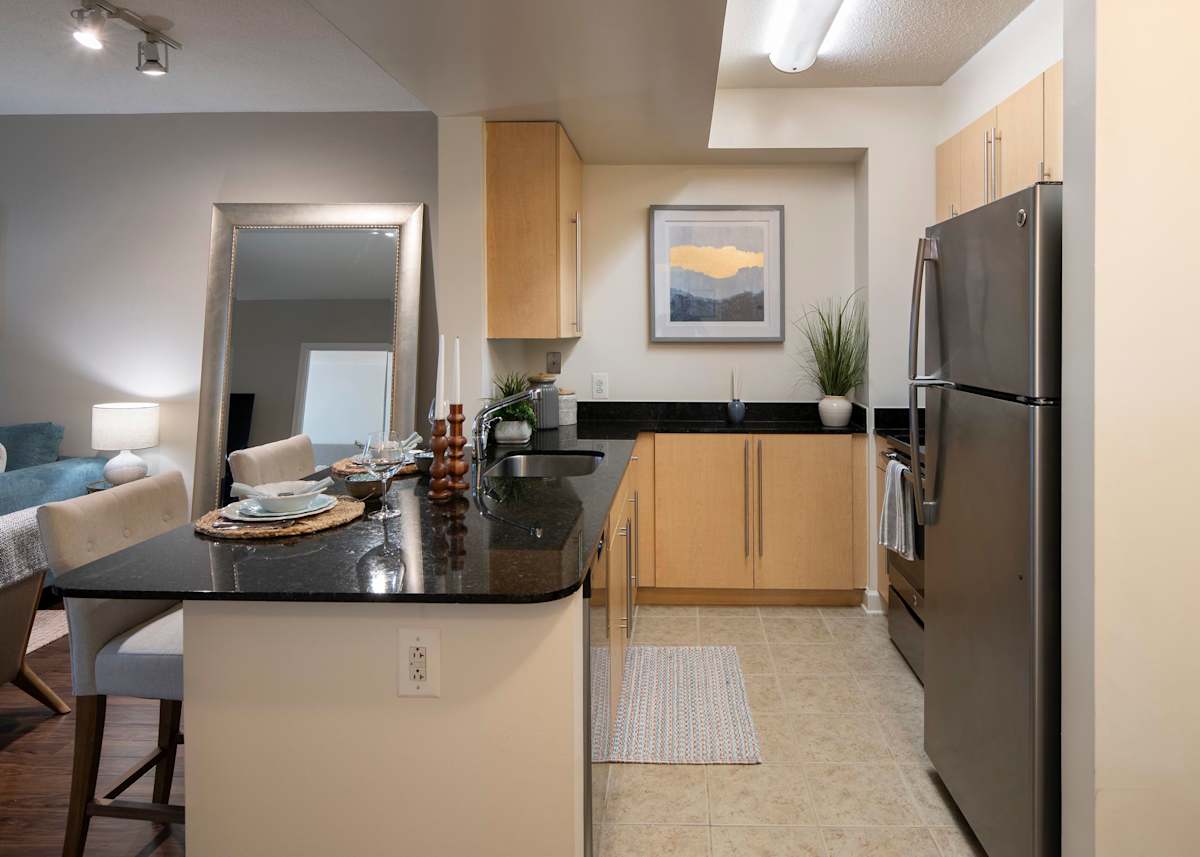 Spinnaker Bay at Harbor East apartment kitchen with stainless appliances - Baltimore, MD