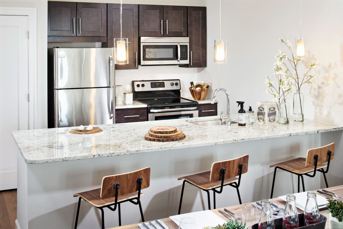 Takoma Central apartment kitchen with stainless appliances - Washington, DC