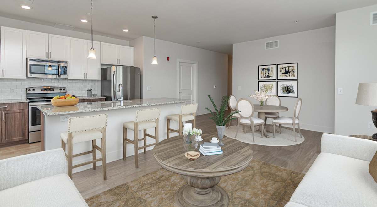 The Square apartment kitchen with quartz counters and stainless appliances - Ardmore, PA