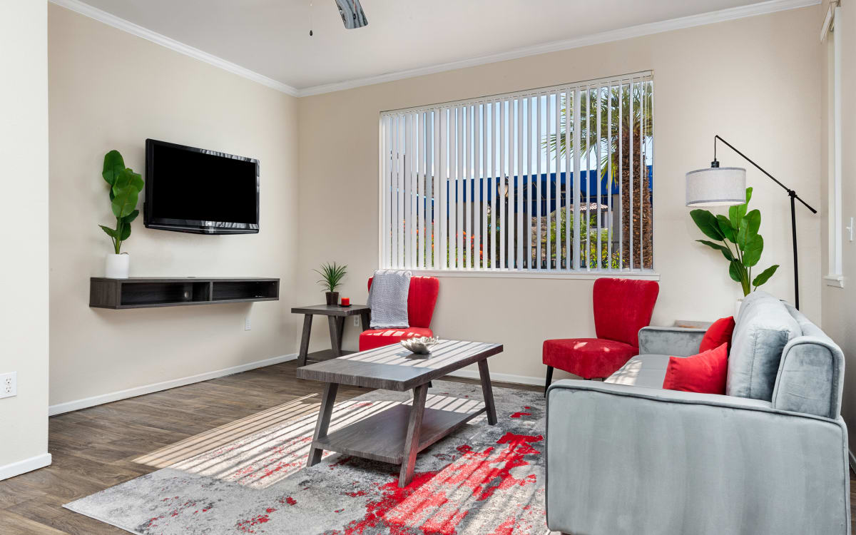 Furnished apartment living area shown — representative home at Mountainside.