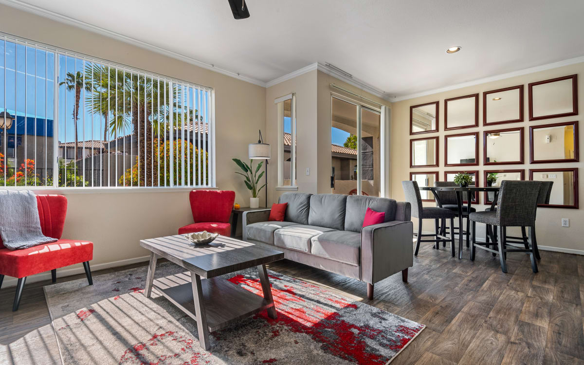 Furnished apartment living area shown — representative home at Mountainside.