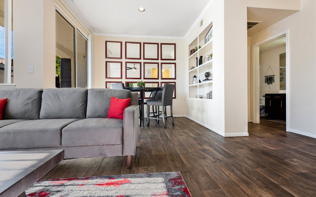 Furnished apartment living area shown — representative home at Mountainside.