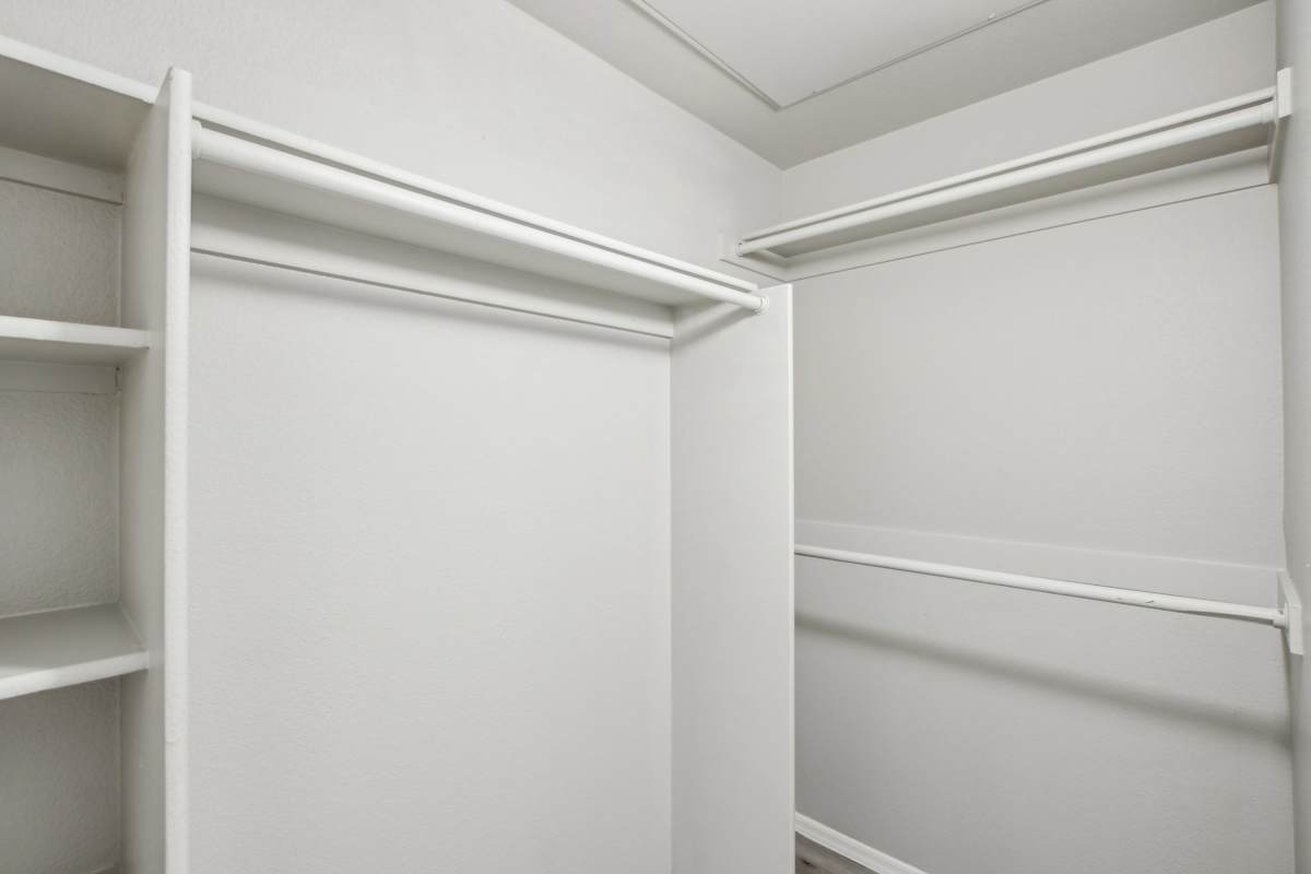 Walk-in closet — representative home at Sweetwater at Metro North.