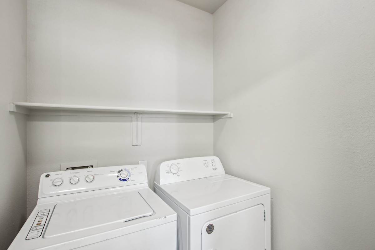 In-home laundry area — representative home at Sweetwater at Metro North.
