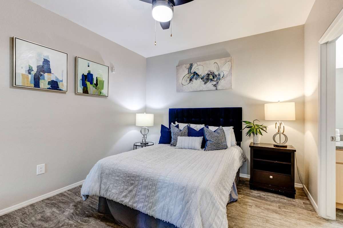 Furnished bedroom shown — representative home at Sweetwater at Metro North.