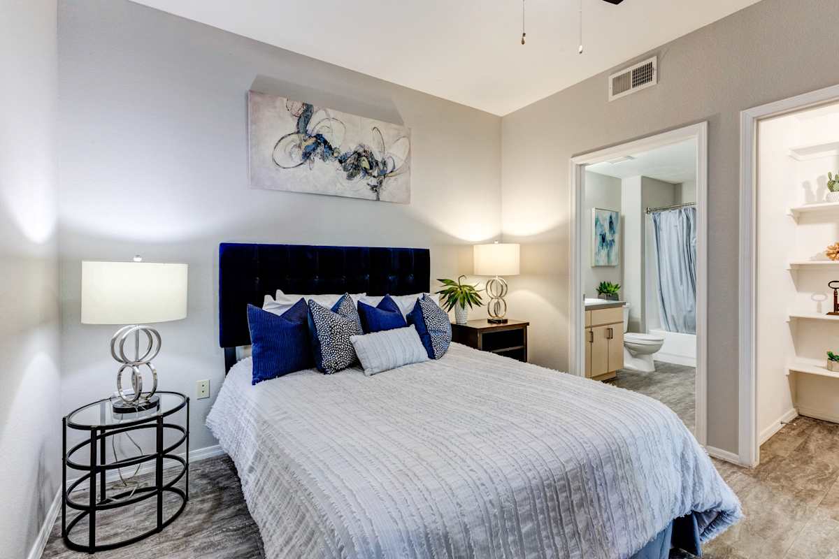 Furnished bedroom shown — representative home at Sweetwater at Metro North.