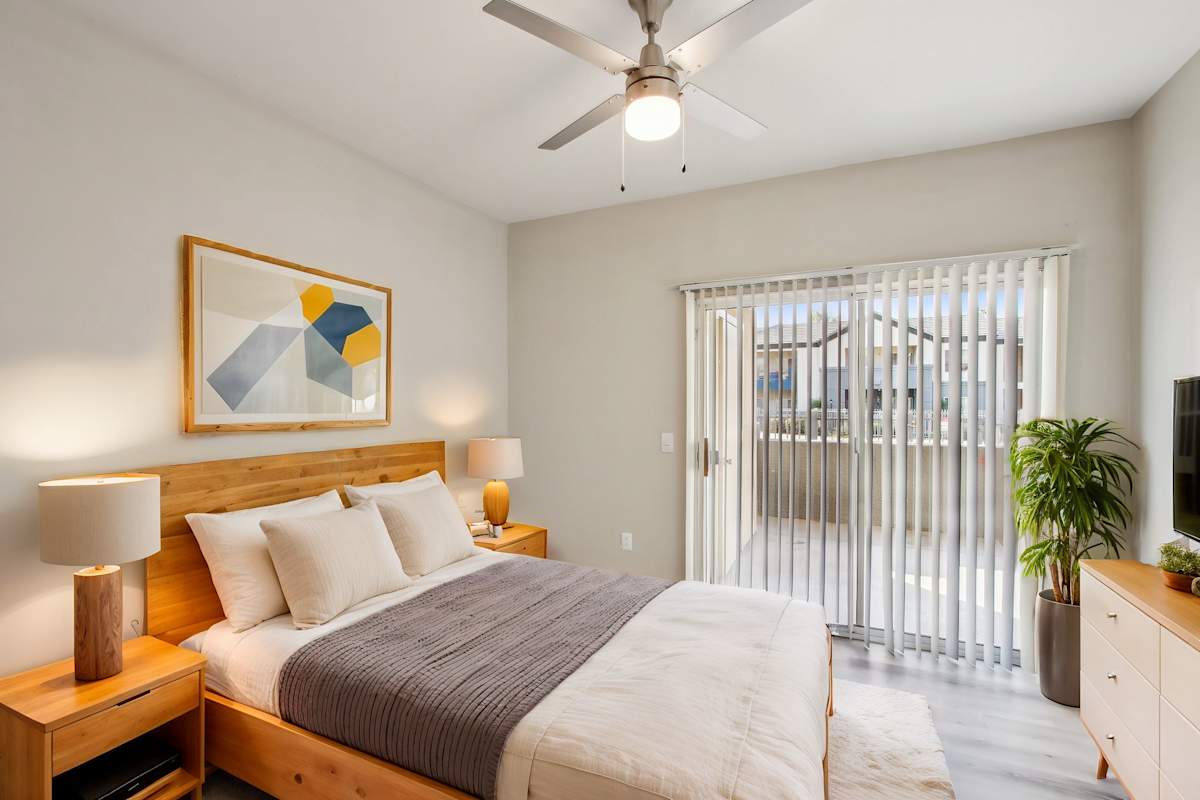 Furnished bedroom shown — representative home at Sweetwater at Metro North.