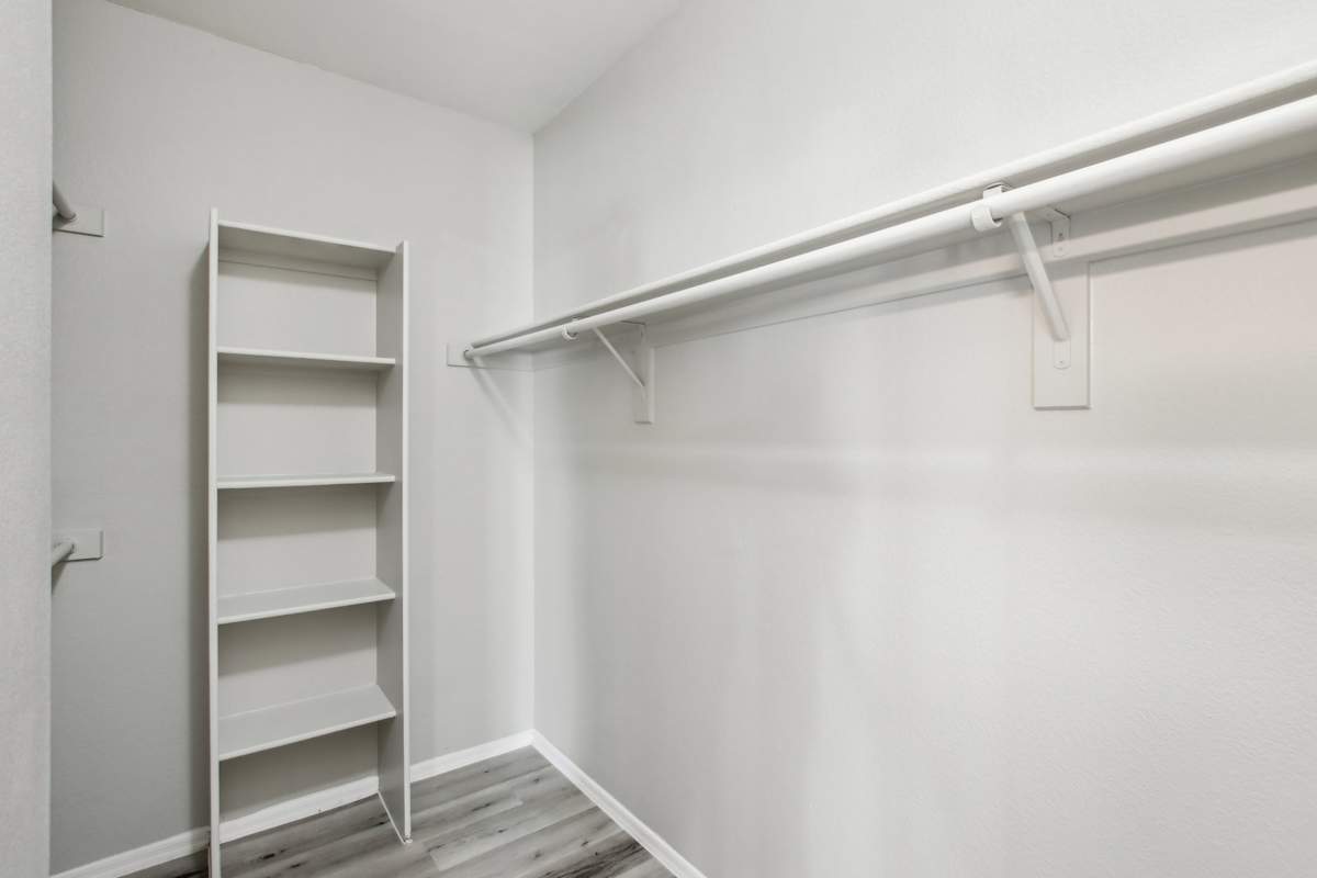 Walk-in closet — representative home at Sweetwater at Metro North.