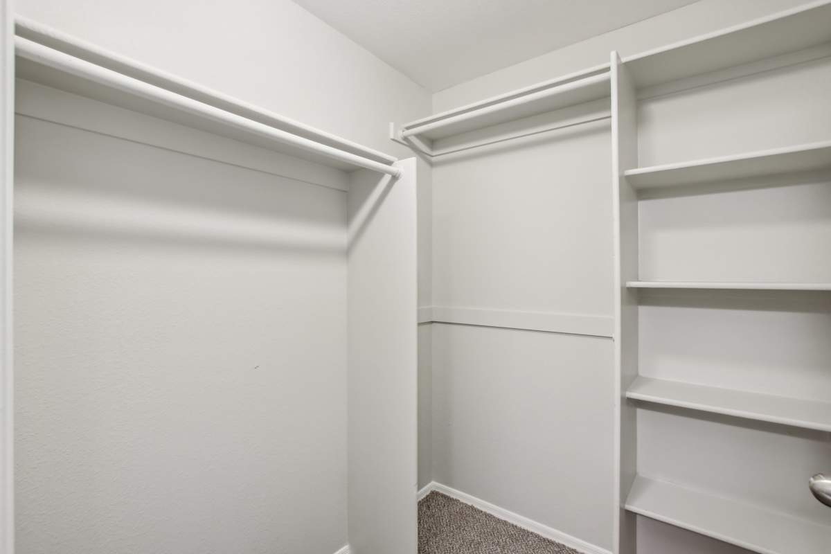 Walk-in closet — representative home at Sweetwater at Metro North.