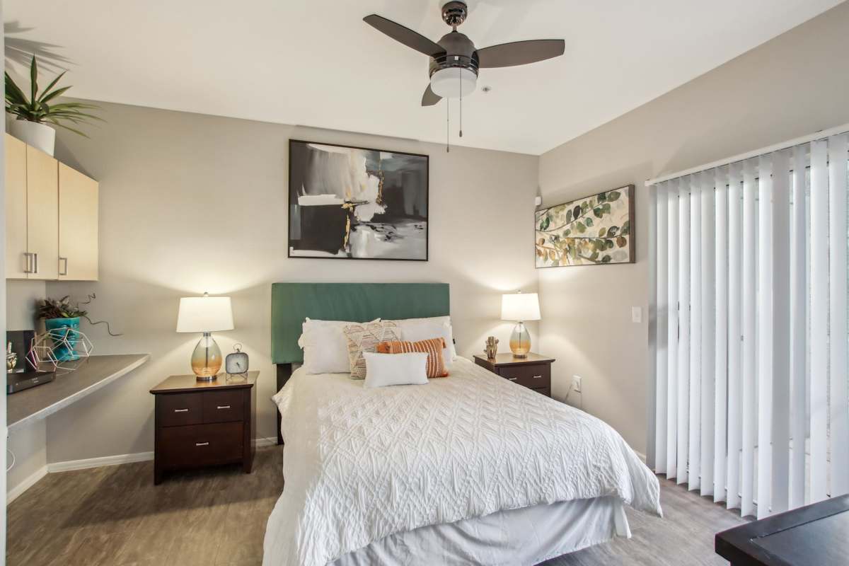 Furnished bedroom shown — representative home at Sweetwater at Metro North.