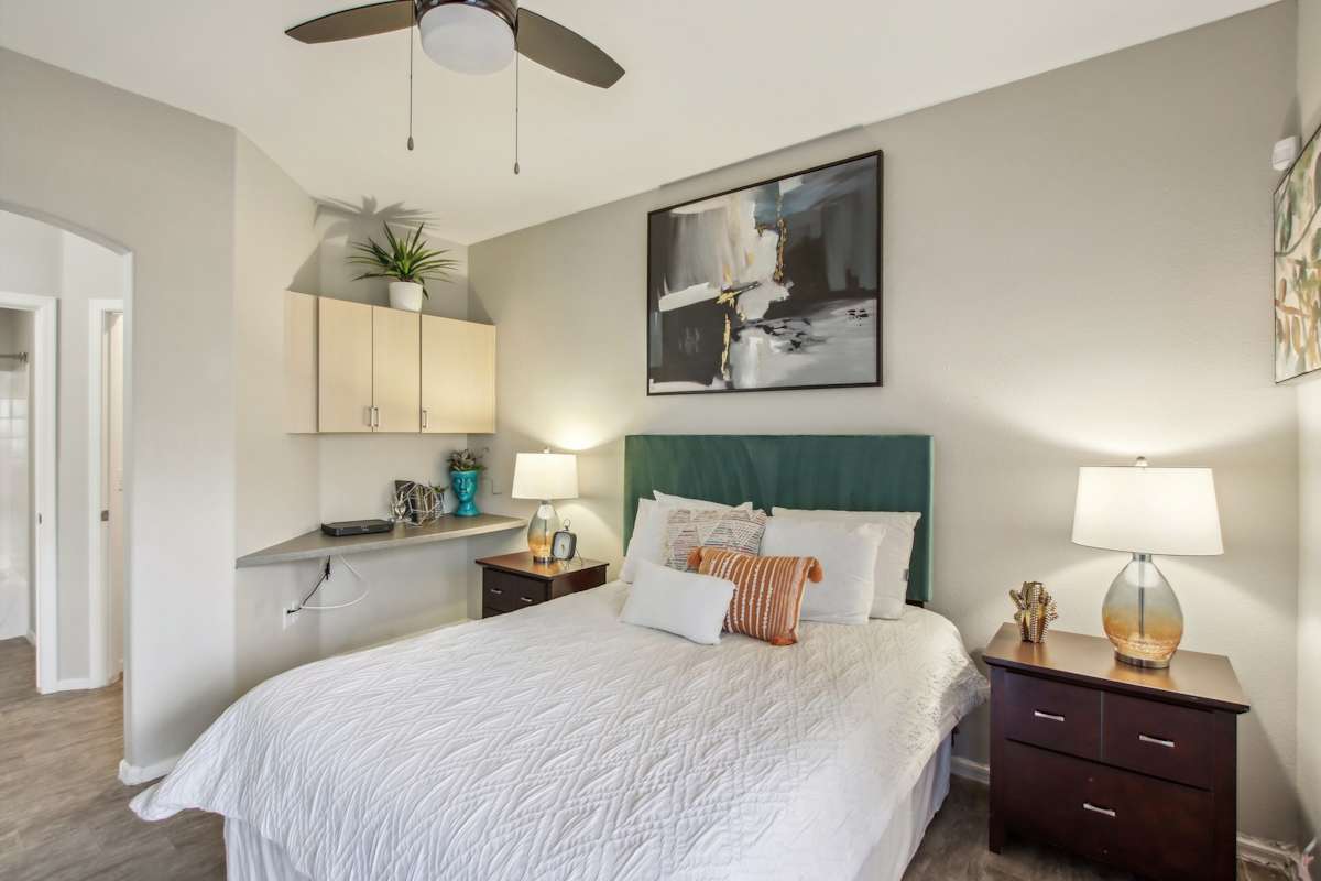 Furnished bedroom shown — representative home at Sweetwater at Metro North.