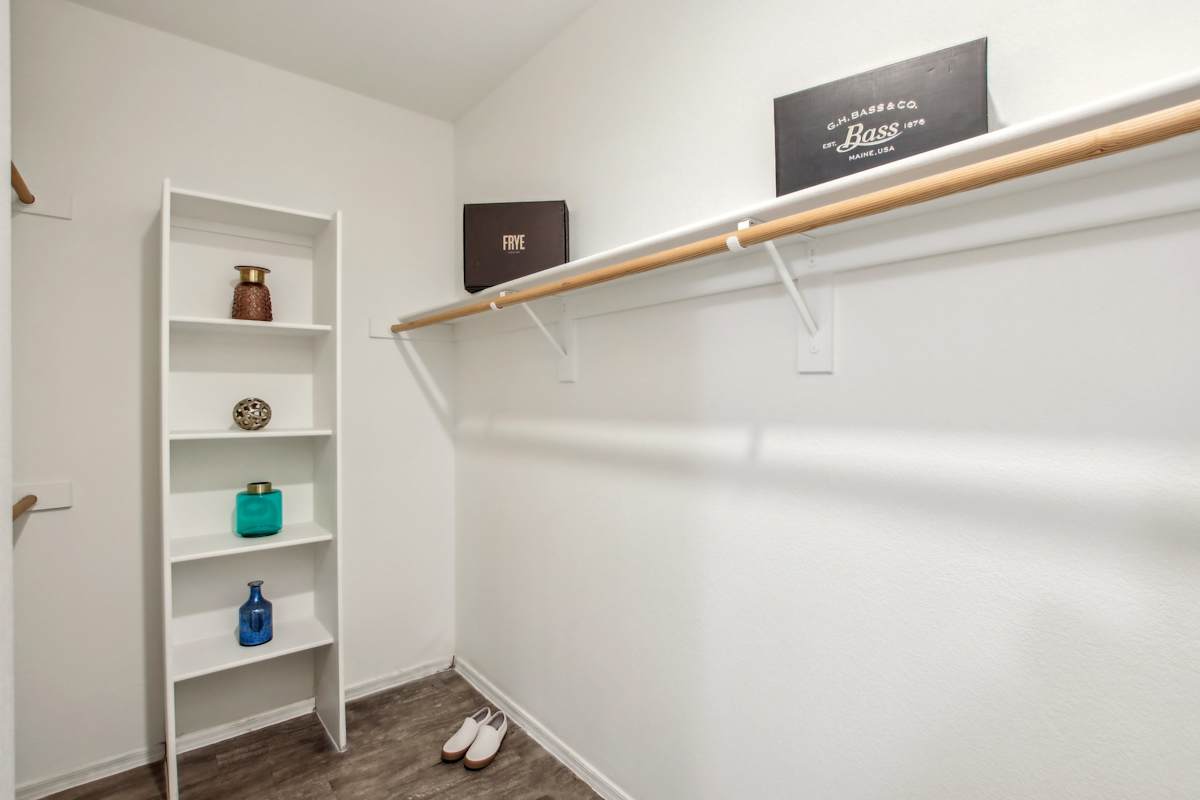 Walk-in closet — representative home at Sweetwater at Metro North.