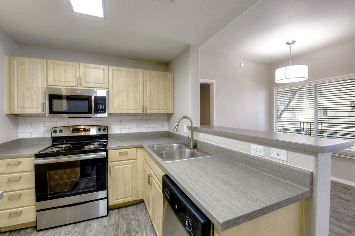 Apartment kitchen — representative home at Sweetwater at Metro North.