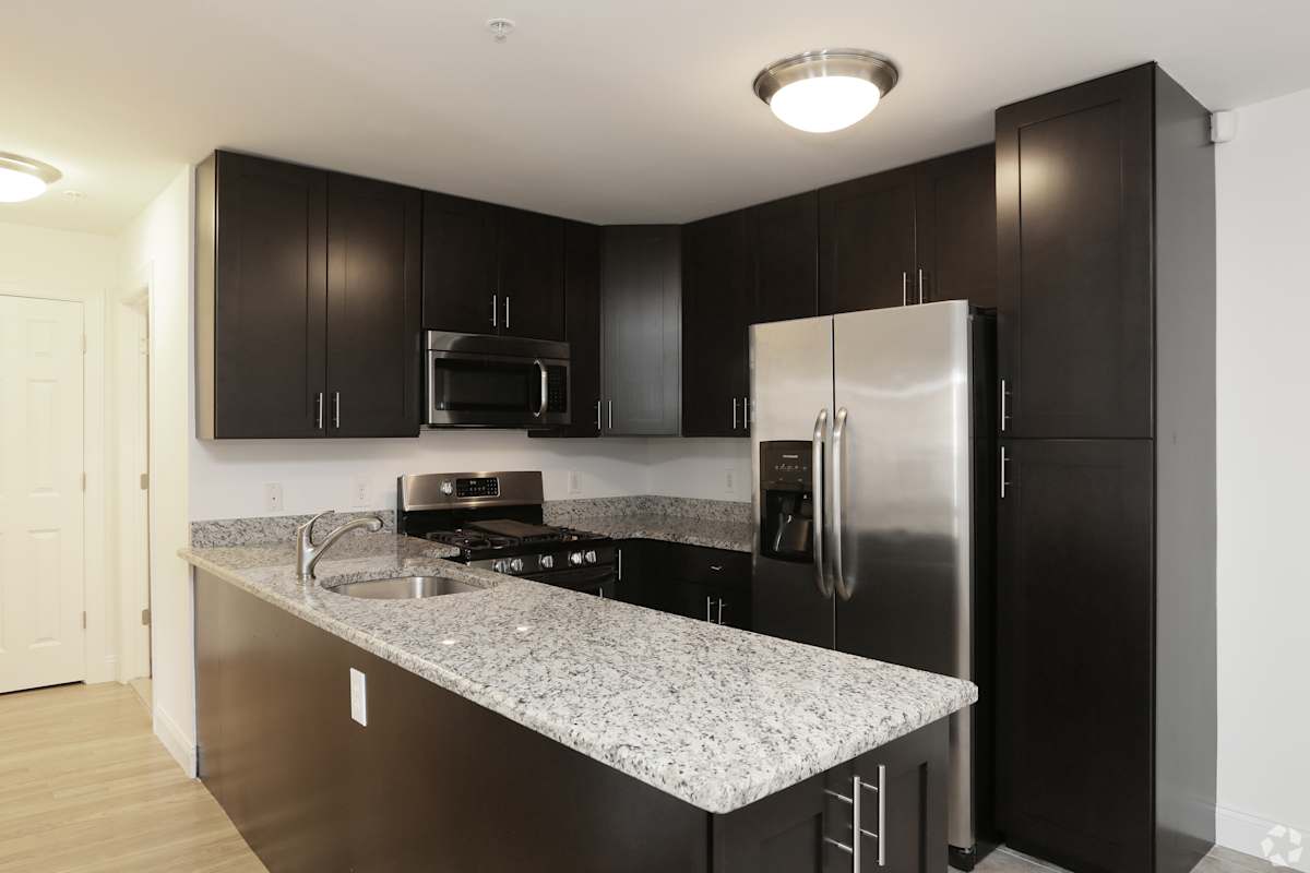 Mariners Landing espresso kitchen with stainless appliances - Edgewater, NJ