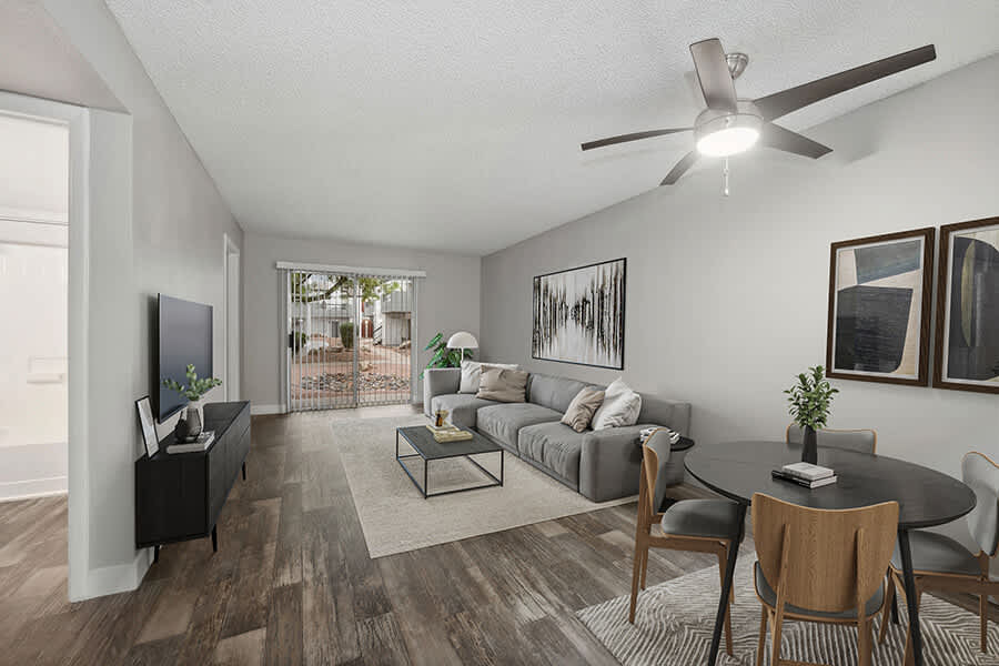 Furnished apartment living area shown — representative home at Crystal Creek.