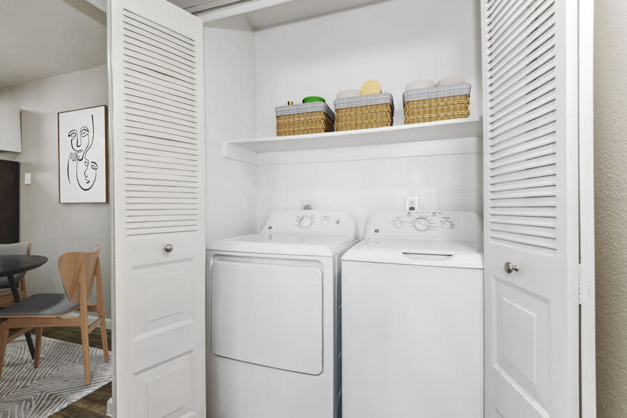 In-home laundry area — representative home at Lore South Mountain.