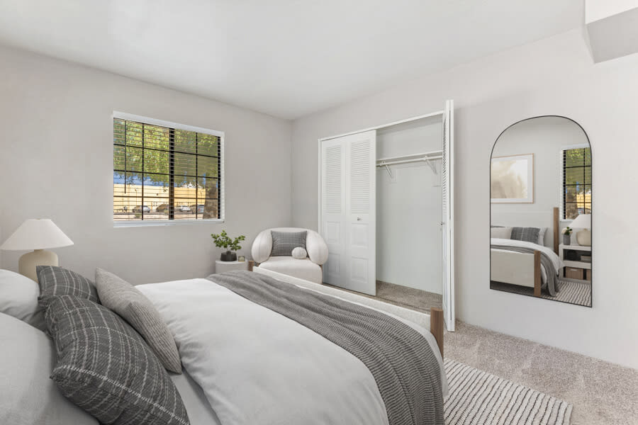 Furnished bedroom shown — representative home at Lore South Mountain.
