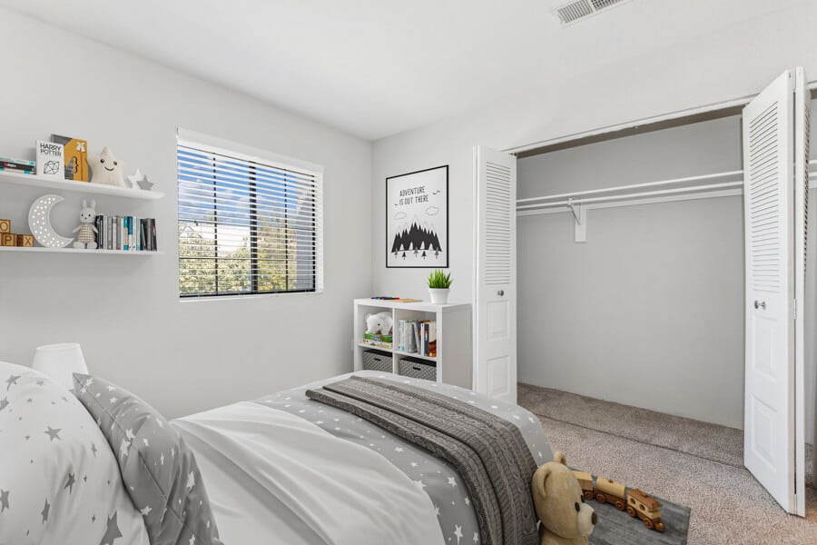 Furnished bedroom shown — representative home at Lore South Mountain.