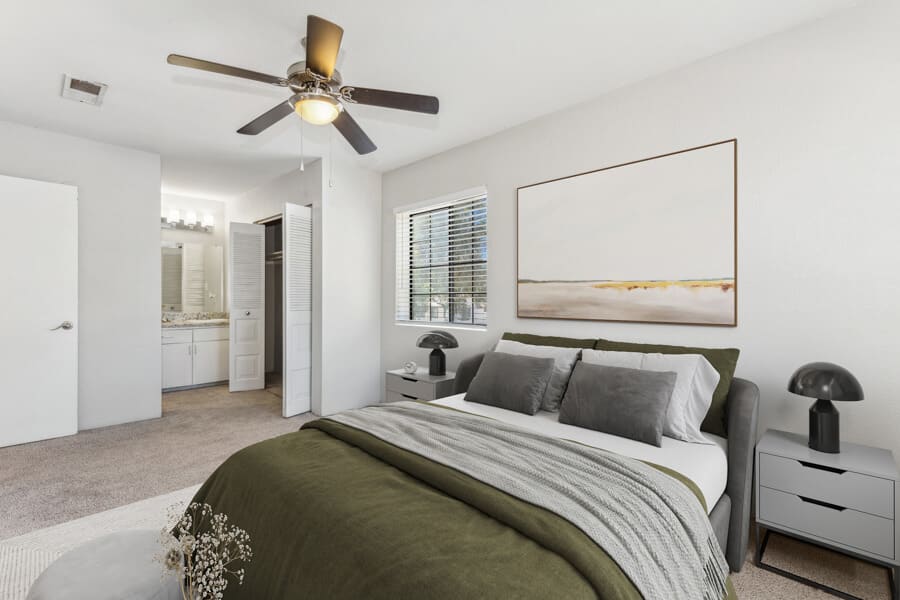 Furnished bedroom shown — representative home at Lore South Mountain.