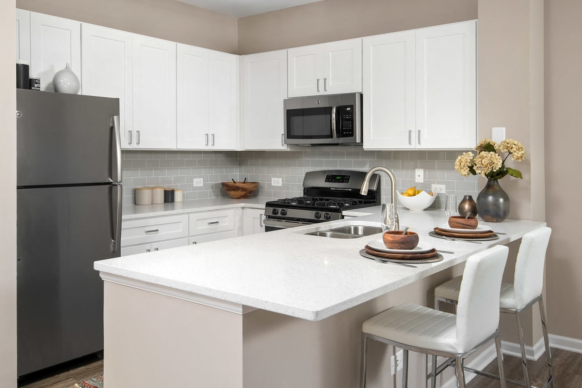 803 Corday at Naperville apartment kitchen with island seating - Naperville, IL