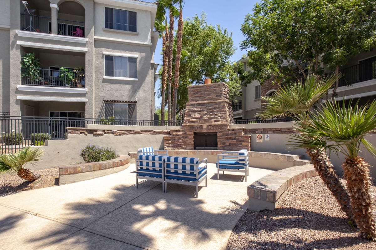 Courtyard seating beside an outdoor fireplace at Ironhorse at Tramonto.