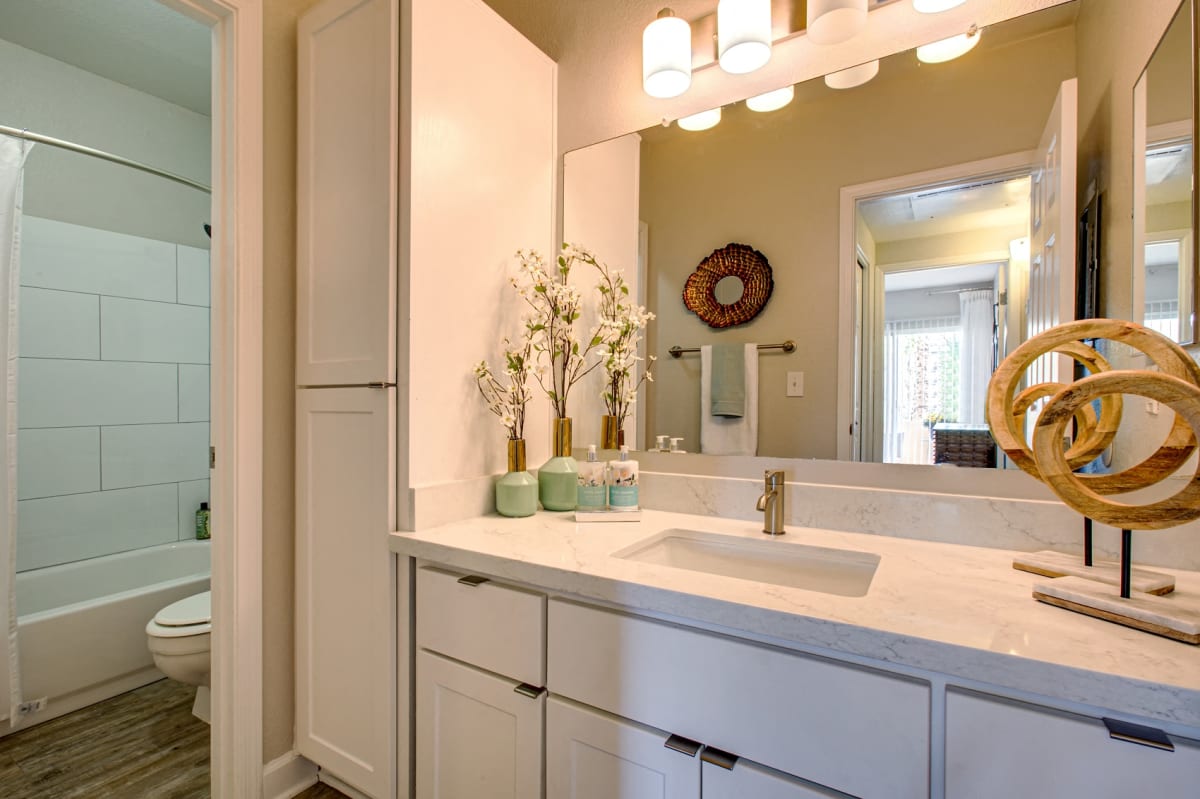 Apartment bathroom — representative home at Village at Lakewood.