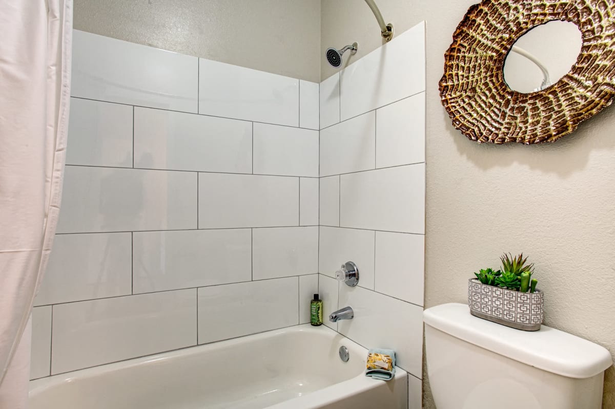 Apartment bathroom — representative home at Village at Lakewood.