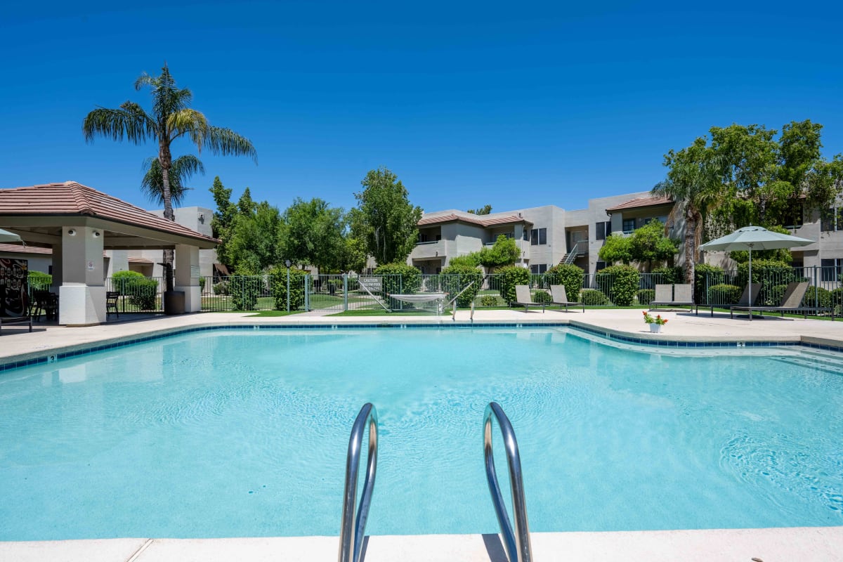 Pool and poolside area at Village at Lakewood.