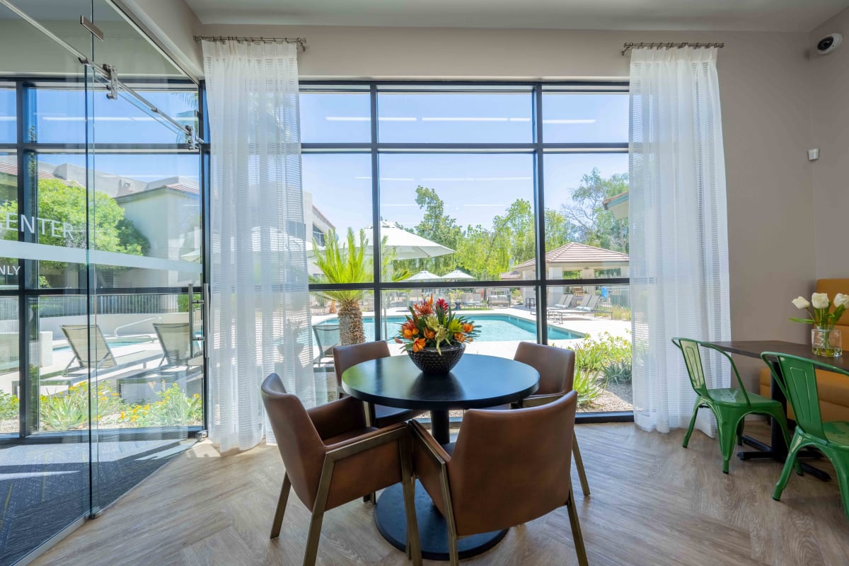 Furnished dining area shown — representative home at Village at Lakewood.