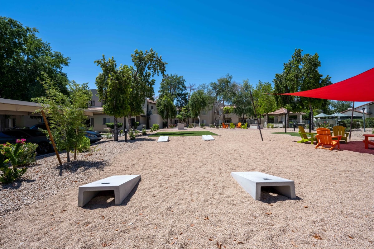 Cornhole game at Village at Lakewood.