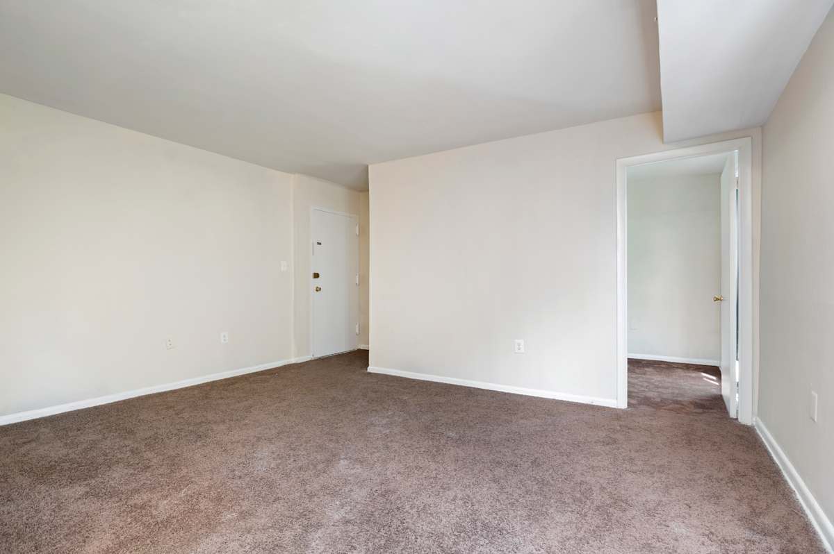 Park Pleasant Apartments bedroom with carpet and white walls - Washington, DC