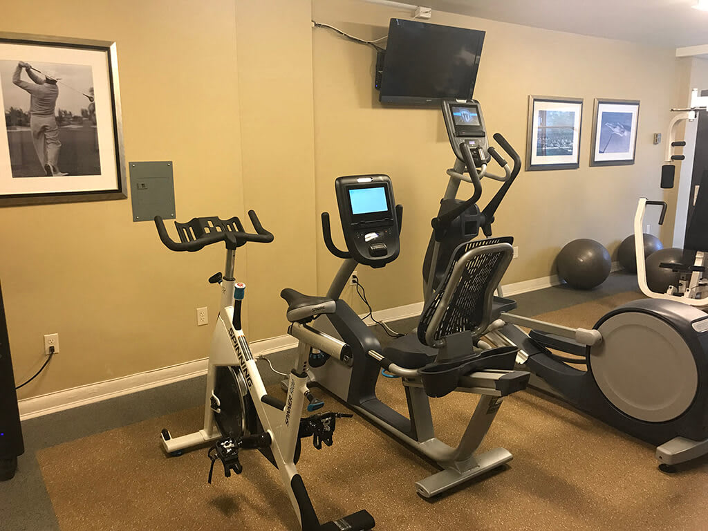The 925 Apartments fitness center with exercise bikes and ellipticals - Washington, DC
