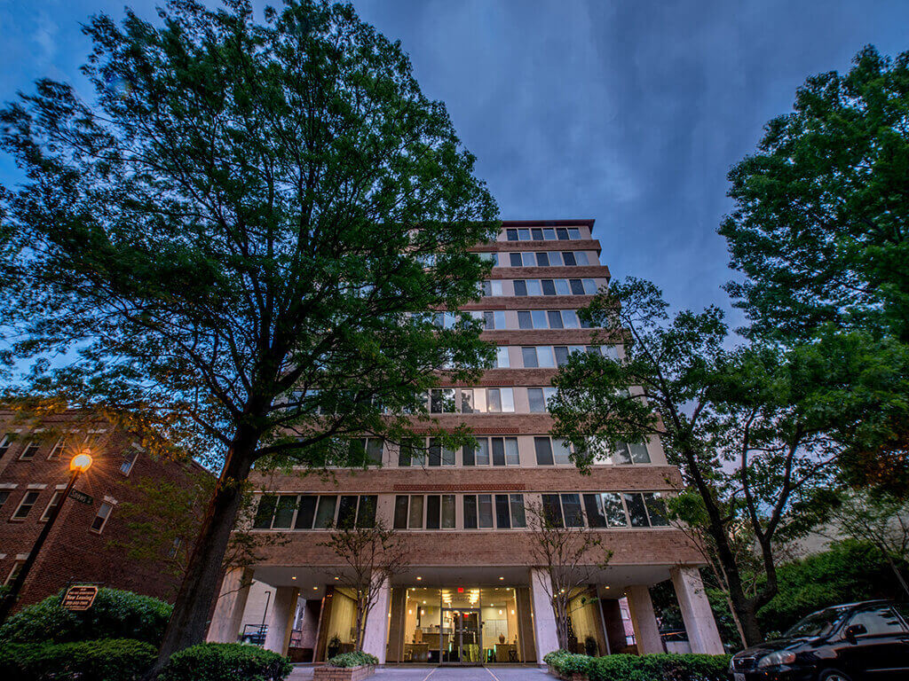 The 925 Apartments building exterior at night - Washington, DC